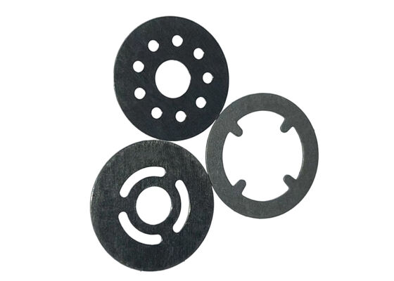 Shock Valve Shims used in automotive and industrial engines to optimize valve timing and reduce wear on valve components