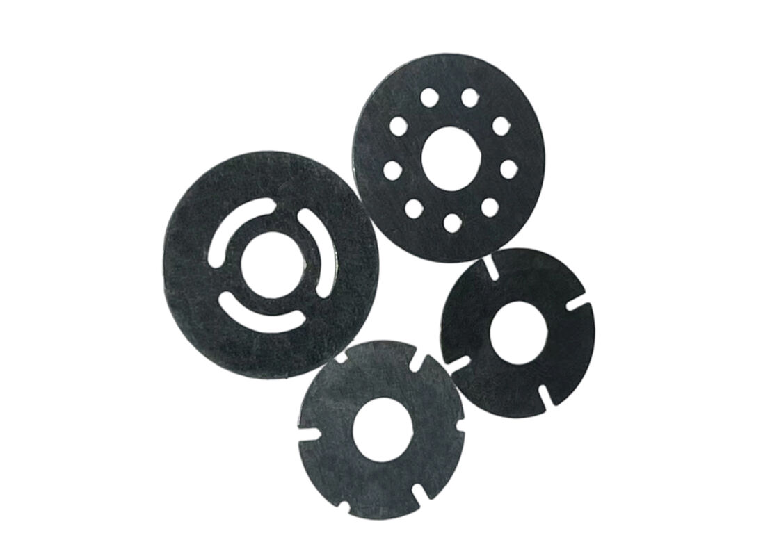 Shock Valve Shims used in automotive and industrial engines to optimize valve timing and reduce wear on valve components
